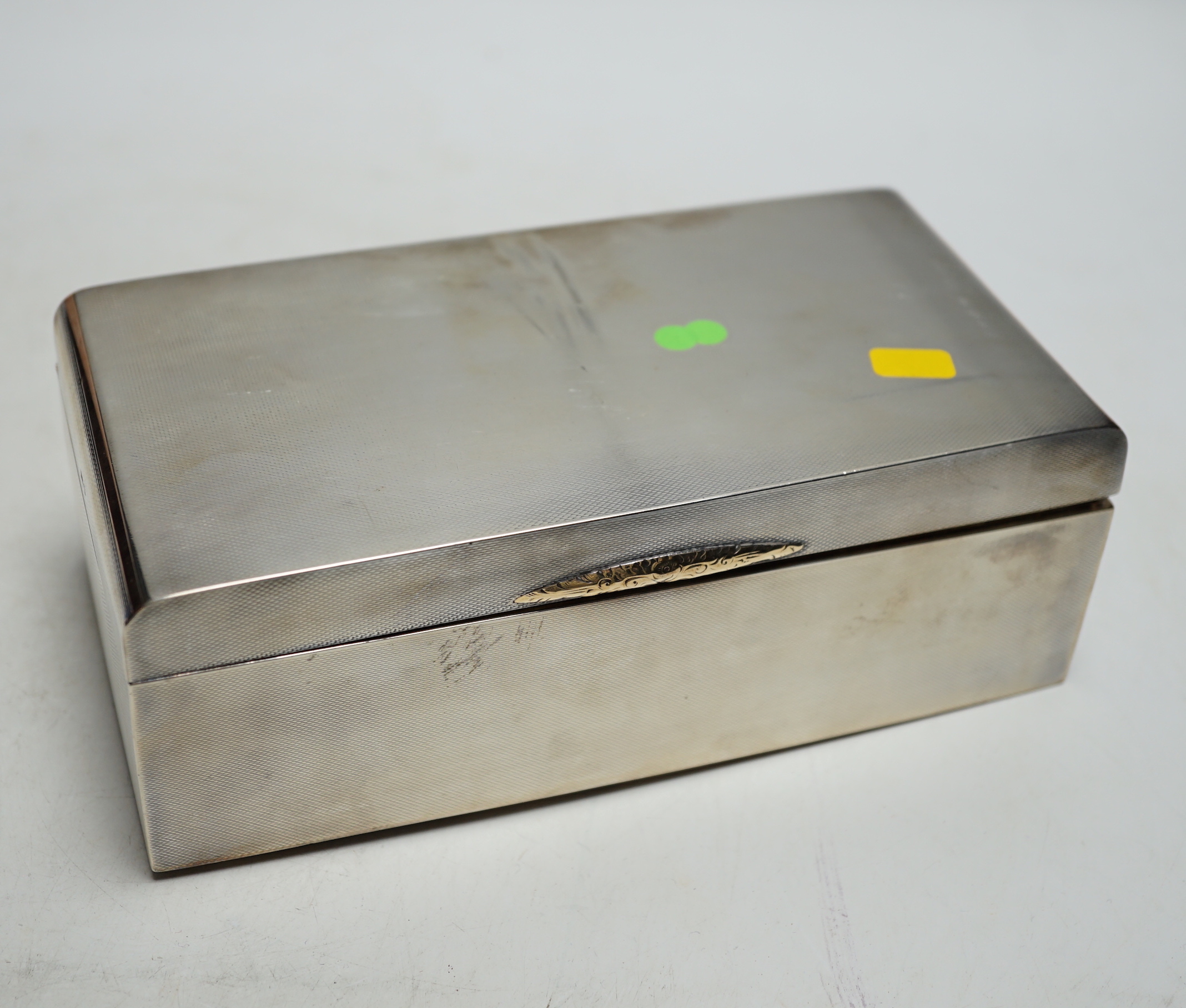 A George VI silver mounted cigarette box, Walker & Hall, Sheffield, 1946, 18cm.